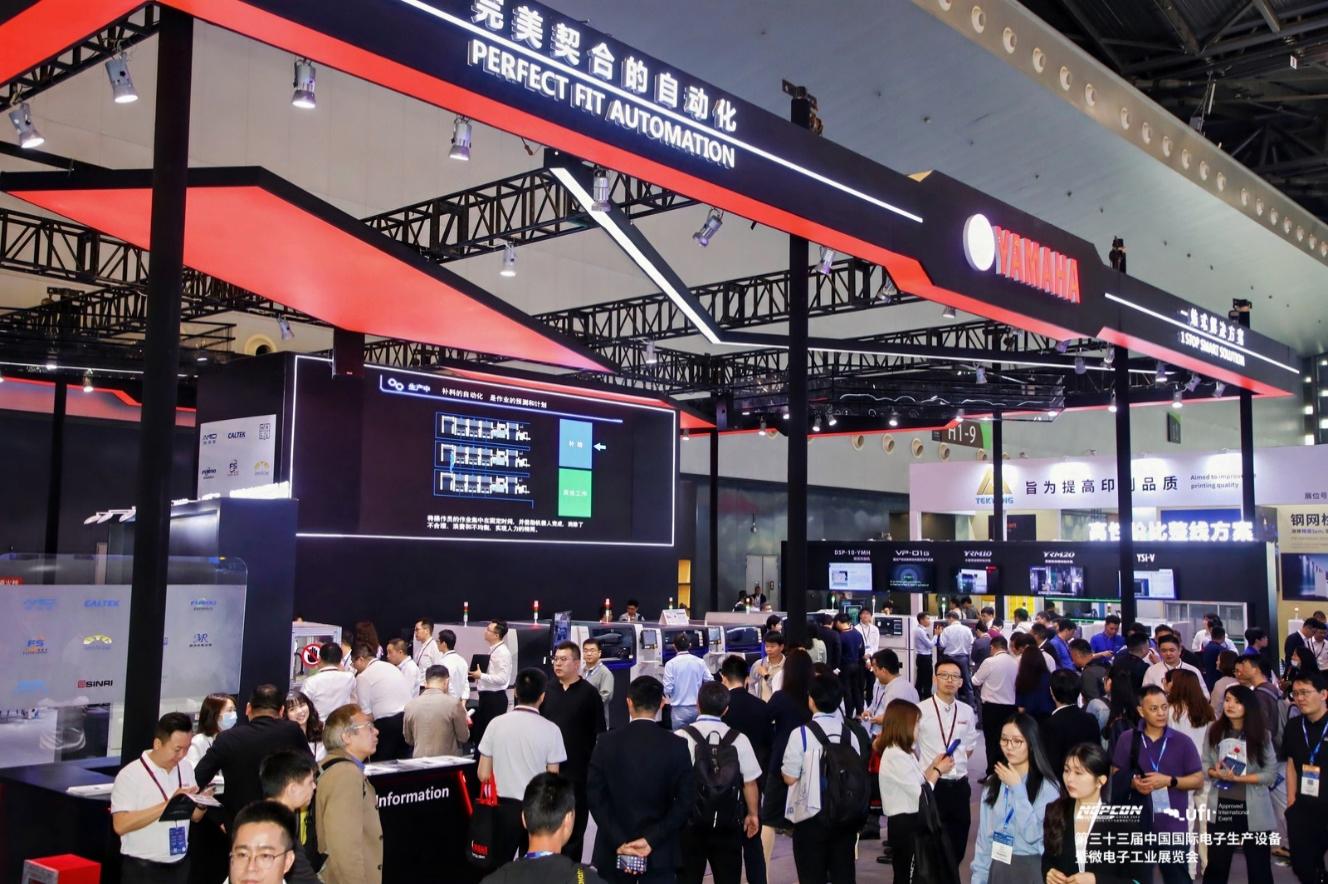 A group of people in a large room AI-generated content may be incorrect.